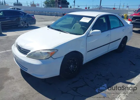 2004 Toyota Camry Le z USA, uszkodzony, nr VIN 4T1BE32K24U372654